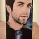 Image for article titled B.J. Novak's public domain headshot is being used to sell ponchos, cologne, face paint, and more